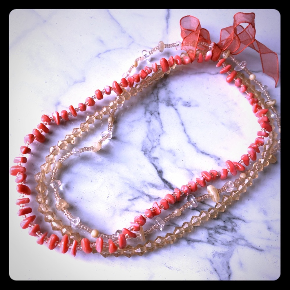 Coral colored beaded round stretch necklace